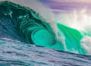 What are waves made of in quantum field theory?