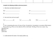 What instrument measures mass in the metric system?