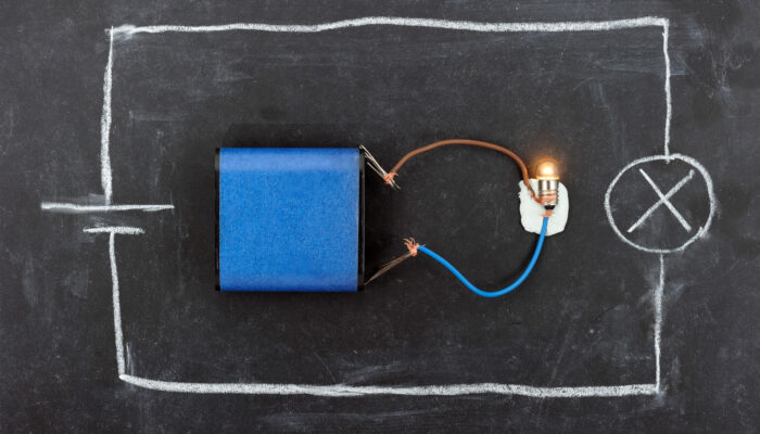 Is it possible to create a particle from energy?