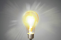 If light is made of particles how does it pass through glass?