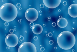 Bubbles Feel the Heat: Microscopic Collapse Meets Thermodynamics