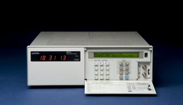 What is the difference between cesium and an atomic clock?