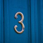 Which of the 3 subatomic particles is the smallest in mass?