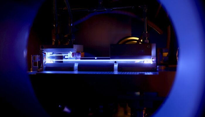 How bright is the focused beam in a particle accelerator?