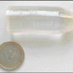 Flawed by Design: When Defects Make Lasers Work Better