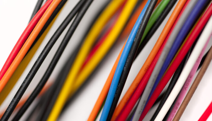 How to wire a 1000-qubit trapped ion quantum computer?